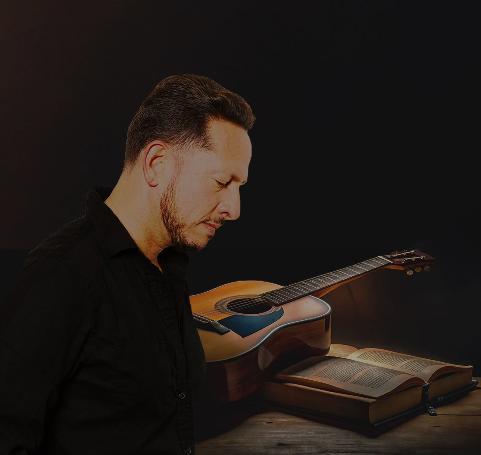Studio portrait with guitar and book